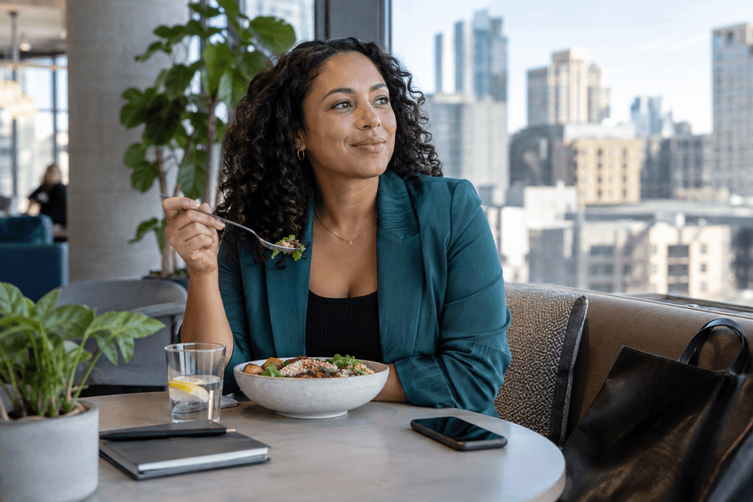 A confident person having a balanced lunch during a workday